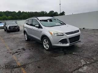 2013 Ford Escape SE with VIN 1FMCU0GX7DUB00465, listed as a Copart auction lot 58265705 with 227,613 mi miles and Salvage title. Bid and sale history available at DreamBid. Image 14.