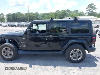 2021 Jeep Wrangler Unlimited Sahara with VIN 1C4HJXEN9MW681422, listed as a IAAI auction lot 42563426 with 48,582 mi miles and . Bid and sale history available at DreamBid. Image 14.