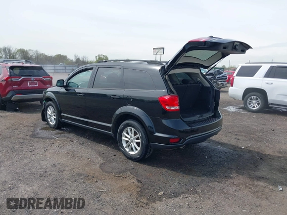 2014 Dodge Journey SXT with VIN 3C4PDCBG2ET262014, listed as a IAAI auction lot 41898343 with 199,732 mi miles. Bid and sale history available at carsss.com. Image 3.