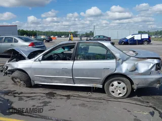 2001 Honda Accord EX z VIN 1HGCG16561A021742, wystawiony jako IAAI lot #42138513 z przebiegiem 217 113 mil mil oraz . Historia ofert i sprzedaży dostępna na DreamBid. Obrazek 15.