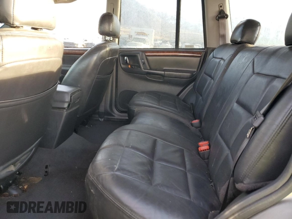 1998 Jeep Grand Cherokee Limited с VIN 1J4GZ78Y0WC260231, выставлен на аукционе Copart как лот 85149724 с пробегом 203 258 миль миль и Списание • Salvage title. История ставок и продаж доступна на DreamBid. Изображение 11.