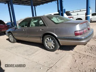 1997 Cadillac Seville Luxury SLS z VIN 1G6KS52Y5VU815770, wystawiony jako Copart lot #88555205 z przebiegiem 92 459 mil mil oraz Czysty tytuł • Clean title. Historia ofert i sprzedaży dostępna na DreamBid. Obrazek 2.