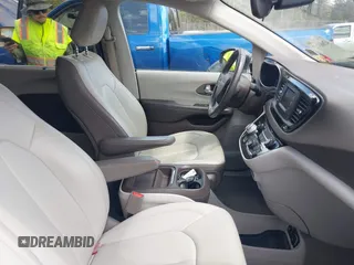 2017 Chrysler Pacifica Touring L with VIN 2C4RC1BGXHR667397, listed as a IAAI auction lot 42085117 with 63,996 mi miles and . Bid and sale history available at DreamBid. Image 5.