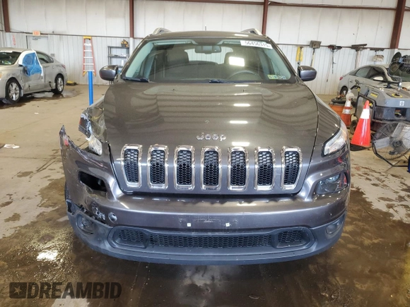2015 Jeep Cherokee Latitude with VIN 1C4PJMCS0FW550661, listed as a Copart auction lot 56456315 with 62,205 mi miles and Salvage Title. Bid and sale history available at DreamBid. Image 5.
