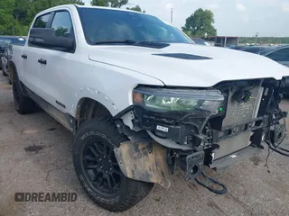2025 Ram 1500 Rebel with VIN 1C6SRFLP1SN576994, listed as a IAAI auction lot 42767833 with 26,955 mi miles and . Bid and sale history available at DreamBid. Image 1.