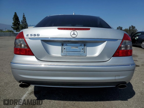 2008 Mercedes-Benz E 550 Sport with VIN WDBUF72X98B297805, listed as a Copart auction lot 61970255 with 248,178 mi miles and Salvage title. Bid and sale history available at DreamBid. Image 6.