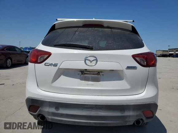 2015 Mazda CX-5 Touring with VIN JM3KE2CY5F0548826, listed as a Copart auction lot 52686565 with 139,602 mi miles and Salvage Title. Bid and sale history available at carsss.com. Image 6.