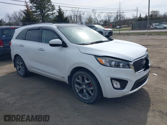 2016 Kia Sorento SX z VIN 5XYPKDA54GG101802, wystawiony jako IAAI lot #41784161 z przebiegiem 99 162 mil mil oraz . Historia ofert i sprzedaży dostępna na DreamBid. Obrazek 1.