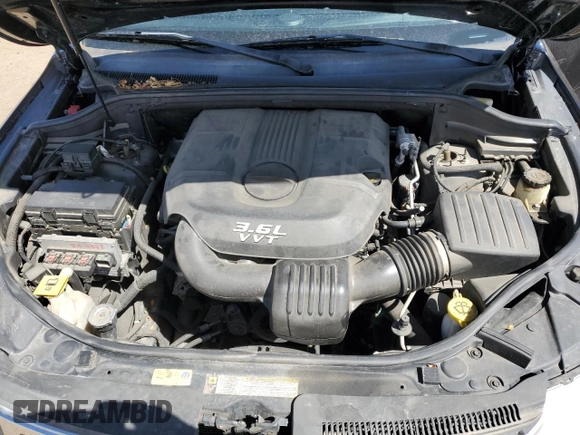 2013 Jeep Grand Cherokee Overland with VIN 1C4RJFCG5DC638927, listed as a Copart auction lot 52752615 with 117,494 mi miles and Salvage Title. Bid and sale history available at carsss.com. Image 12.