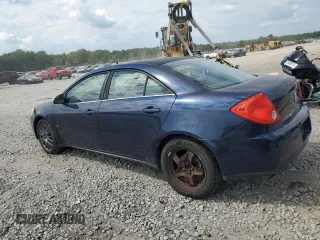 2009 Pontiac G6 w/1SA *Ltd Avail* with VIN 1G2ZG57B094133844, listed as a Copart auction lot 70451604 with 165,466 mi miles and Salvage Title. Bid and sale history available at carsss.com. Image 2.