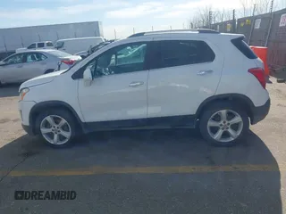 2016 Chevrolet Trax LTZ with VIN 3GNCJRSB4GL165194, listed as a IAAI auction lot 41754666 with 152,471 mi miles. Bid and sale history available at carsss.com. Image 14.