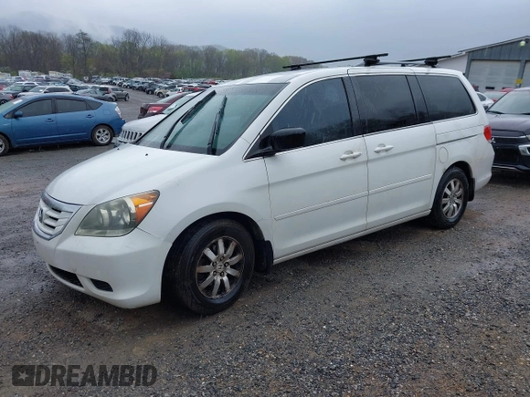 2010 Honda Odyssey EX-L with VIN 5FNRL3H65AB068497, listed as a IAAI auction lot 42013925 with 206,668 mi miles. Bid and sale history available at carsss.com. Image 2.