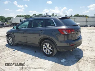 2014 Mazda CX-9 Touring with VIN JM3TB3CA6E0441708, listed as a Copart auction lot 61143785 with 173,562 mi miles and Salvage title. Bid and sale history available at DreamBid. Image 2.