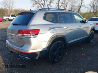 2023 Volkswagen Atlas SE with VIN 1V2HR2CA6PC523233, listed as a IAAI auction lot 41952399 with 28,387 mi miles and . Bid and sale history available at DreamBid. Image 4.