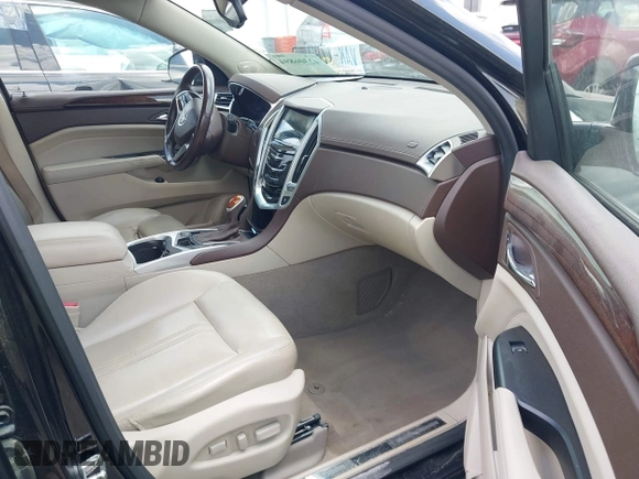 2016 Cadillac SRX Luxury Collection with VIN 3GYFNBE3XGS504059, listed as a IAAI auction lot 42306894 with 87,933 mi miles and . Bid and sale history available at DreamBid. Image 5.