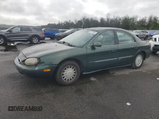1999 Mercury Sable LS Premium Group with VIN 1MEFM53S1XG646186, listed as a Copart auction lot 64737985 with 115,618 mi miles and Clean title. Bid and sale history available at DreamBid. Image 1.