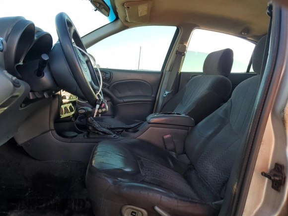 2004 Pontiac Grand Am SE1 with VIN 1G2NF52E34M567770, listed as a Copart auction lot 82089934 with 215,976 mi miles and Salvage Title. Bid and sale history available at carsss.com. Image 7.