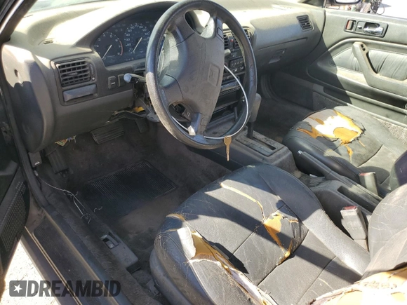 1992 Honda Accord z VIN 1HGCB7254NA015113, wystawiony jako Copart lot #77223284 z przebiegiem 219 007 mil mil oraz Szkoda całkowita • Salvage title. Historia ofert i sprzedaży dostępna na DreamBid. Obrazek 8.