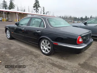 2004 Jaguar XJ with VIN SAJWA71C94SG29019, listed as a IAAI auction lot 41664978 with 133,546 mi miles. Bid and sale history available at carsss.com. Image 3.