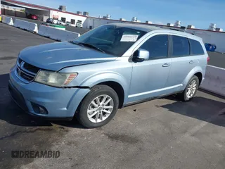 2013 Dodge Journey SXT with VIN 3C4PDCBG4DT584135, listed as a IAAI auction lot 41902149 with 165,700 mi miles and . Bid and sale history available at carsss.com. Image 12.