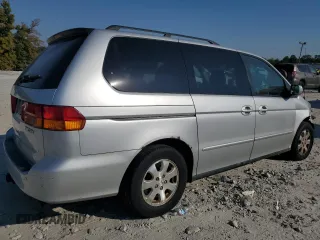 2003 Honda Odyssey EX z VIN 5FNRL18673B014271, wystawiony jako Copart lot #68613374 z przebiegiem 236 360 mil mil oraz Nie do naprawy • Non repairable. Historia ofert i sprzedaży dostępna na DreamBid. Obrazek 3.