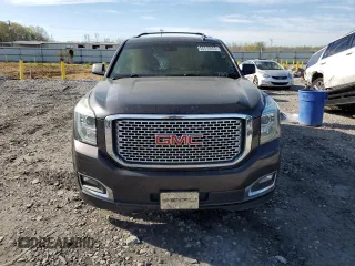 2015 GMC Yukon Denali with VIN 1GKS2CKJ9FR727818, listed as a Copart auction lot 50410655 with 0 mi miles and Salvage Title. Bid and sale history available at carsss.com. Image 5.