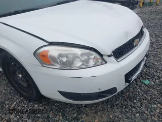 2013 Chevrolet Impala Police with VIN 2G1WD5E33D1210058, listed as a IAAI auction lot 41574143 with 156,643 mi miles. Bid and sale history available at carsss.com. Image 14.