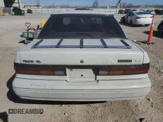 1992 Ford Tempo GL z VIN 2FAPP36XXNB207779, wystawiony jako Copart lot #49348685 z przebiegiem 526 491 mil mil oraz Tytuł czysty. Historia ofert i sprzedaży dostępna na DreamBid. Obrazek 6.