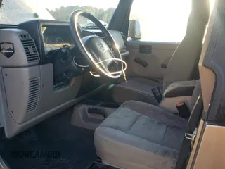 2004 Jeep Wrangler Rubicon with VIN 1J4FA69S74P787812, listed as a Copart auction lot 84715464 with 150,320 mi miles and Salvage Title. Bid and sale history available at carsss.com. Image 7.