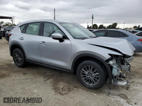 2019 Mazda CX-5 Sport with VIN JM3KFABM8K1565789, listed as a Copart auction lot 55978175 with 42,392 mi miles and Salvage Title. Bid and sale history available at DreamBid. Image 4.