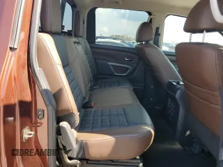 2018 Nissan Titan Pro-4X z VIN 1N6AA1E50JN526481, wystawiony jako Copart lot #71800504 z przebiegiem 147 463 mil mil oraz Szkoda całkowita • Salvage title. Historia ofert i sprzedaży dostępna na DreamBid. Obrazek 11.