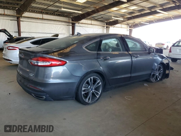 2020 Ford Fusion Titanium with VIN 3FA6P0K92LR115615, listed as a Copart auction lot 60471975 with 73,069 mi miles and Salvage title. Bid and sale history available at DreamBid. Image 3.