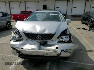 2004 Lexus RX 330 z VIN 2T2GA31U54C008228, wystawiony jako Copart lot #54125085 z przebiegiem 294 297 mil mil oraz Szkoda całkowita • Salvage title. Historia ofert i sprzedaży dostępna na DreamBid. Obrazek 14.