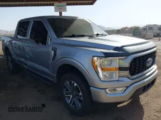 2021 Ford F-150 XL with VIN 1FTEW1CP5MFC34477, listed as a IAAI auction lot 41681276 with 64,157 mi miles. Bid and sale history available at carsss.com. Image 1.