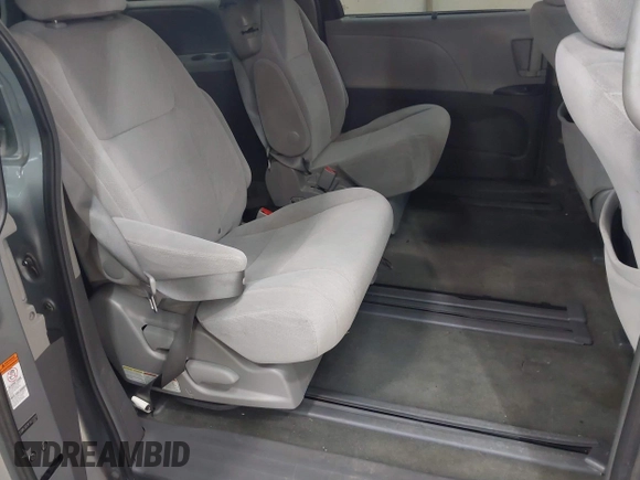 2015 Toyota Sienna LE AAS with VIN 5TDKK3DC9FS622028, listed as a IAAI auction lot 42740303 with 132,529 mi miles and . Bid and sale history available at DreamBid. Image 8.