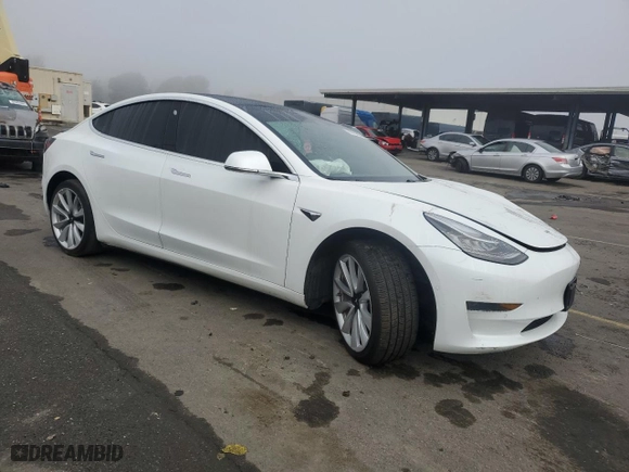 2020 Tesla Model 3 Standard Range Plus with VIN 5YJ3E1EA9LF661618, listed as a Copart auction lot 85731934 with NaN miles and Salvage Title. Bid and sale history available at carsss.com. Image 4.