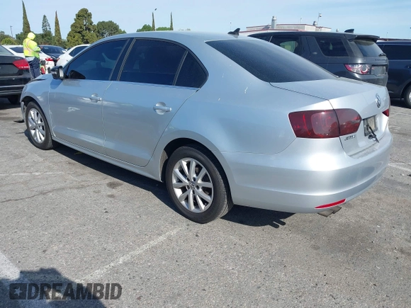 2013 Volkswagen Jetta Sedan SE with VIN 3VWDP7AJ5DM440793, listed as a IAAI auction lot 41936412 with 117,383 mi miles. Bid and sale history available at carsss.com. Image 3.