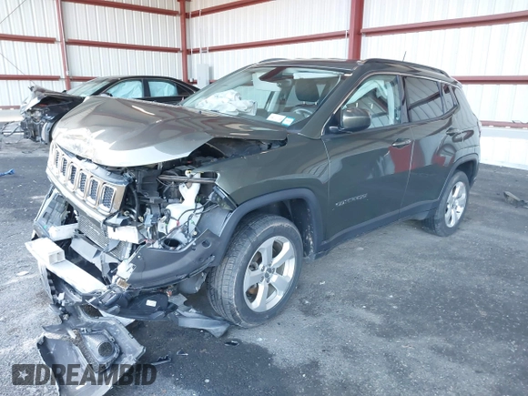 2018 Jeep Compass Altitude with VIN 3C4NJDBB4JT238950, listed as a IAAI auction lot 41815682 with 85,598 mi miles and . Bid and sale history available at DreamBid. Image 18.
