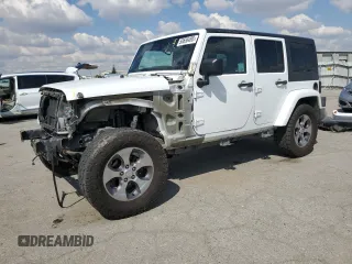 2018 Jeep Wrangler Unlimited Sahara z VIN 1C4HJWEG1JL923144, wystawiony jako Copart lot #50656495 z przebiegiem 121 895 mil mil oraz Szkoda całkowita • Salvage title. Historia ofert i sprzedaży dostępna na DreamBid. Obrazek 1.