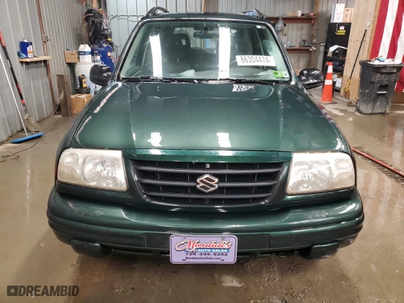 2002 Suzuki Vitara JLX with VIN 2S3TD52V126103138, listed as a Copart auction lot 86304474 with 135,833 mi miles and Salvage Title. Bid and sale history available at carsss.com. Image 5.