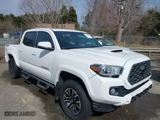 2020 Toyota Tacoma 4WD SR5 with VIN 3TMCZ5AN3LM309635, listed as a IAAI auction lot 41598363 with 99,080 mi miles. Bid and sale history available at carsss.com. Image 1.