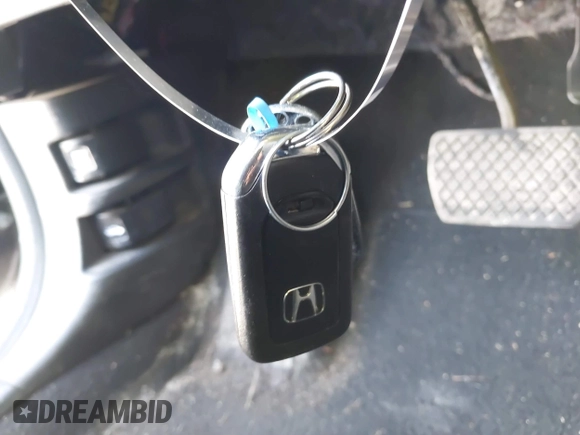 2019 Honda CR-V EX with VIN 2HKRW2H58KH660245, listed as a IAAI auction lot 41773041 with 52,498 mi miles and . Bid and sale history available at DreamBid. Image 11.