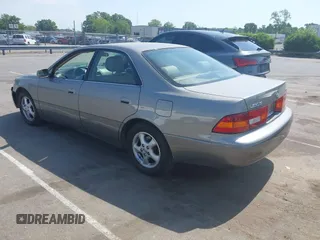 1998 Lexus ES 300 with VIN JT8BF28G3W5031533, listed as a IAAI auction lot 42132801 with 243,178 mi miles and . Bid and sale history available at DreamBid. Image 3.
