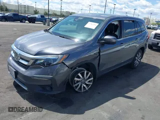 2021 Honda Pilot EX-L with VIN 5FNYF5H57MB046740, listed as a IAAI auction lot 41943366 with 31,198 mi miles and . Bid and sale history available at DreamBid. Image 18.