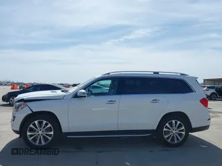 2016 Mercedes-Benz GL with VIN 4JGDF6EE4GA712535, listed as a IAAI auction lot 41822698 with 143,208 mi miles. Bid and sale history available at carsss.com. Image 15.
