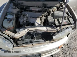 1993 Toyota Camry LE z VIN 4T1SK12E7PU287093, wystawiony jako Copart lot #55682275 z przebiegiem 110 399 mil mil oraz Szkoda całkowita • Salvage title. Historia ofert i sprzedaży dostępna na DreamBid. Obrazek 11.
