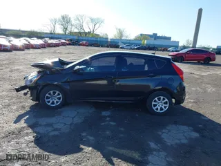 2014 Hyundai Accent GS with VIN KMHCT5AE0EU189319, listed as a IAAI auction lot 41985071 with 72,633 mi miles. Bid and sale history available at carsss.com. Image 14.
