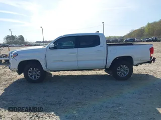 2017 Toyota Tacoma SR5 with VIN 5TFAZ5CN8HX044250, listed as a IAAI auction lot 41848524 with 53,379 mi miles and . Bid and sale history available at DreamBid. Image 14.