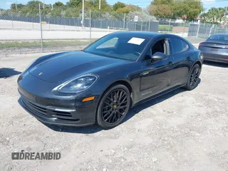 2020 Porsche Panamera 4 E-Hybrid z VIN WP0AE2A79LL132755, wystawiony jako IAAI lot #42040868 z przebiegiem 34 567 mil mil oraz . Historia ofert i sprzedaży dostępna na DreamBid. Obrazek 2.