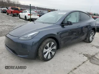 2023 Tesla Model Y Long Range z VIN 7SAYGDEE8PF884567, wystawiony jako Copart lot #45181465 z przebiegiem 16 653 mil mil oraz Szkody całkowita. Historia ofert i sprzedaży dostępna na DreamBid. Obrazek 1.